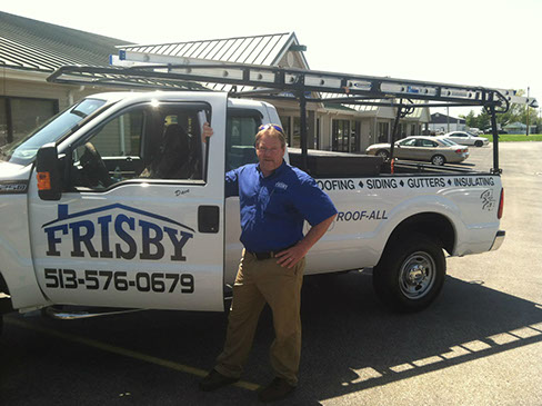 CEO Dave Frisby ready for a roof inspection in Cincinnati in front of Frisby Roofing Offices